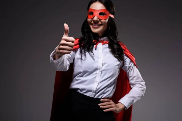 Attractive Super Businesswoman Red Cape Mask Showing Thumb Isolated Black — Stock Photo, Image