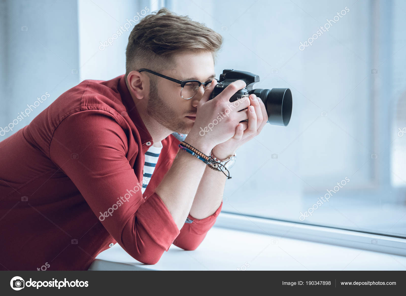 Shooting Digital Photographs Through >> Young Photographer Shooting Digital Camera Light Window Stock Shooting Digital Photographs Through >> Young Photographer Shooting Digital Camera Light Window Stock