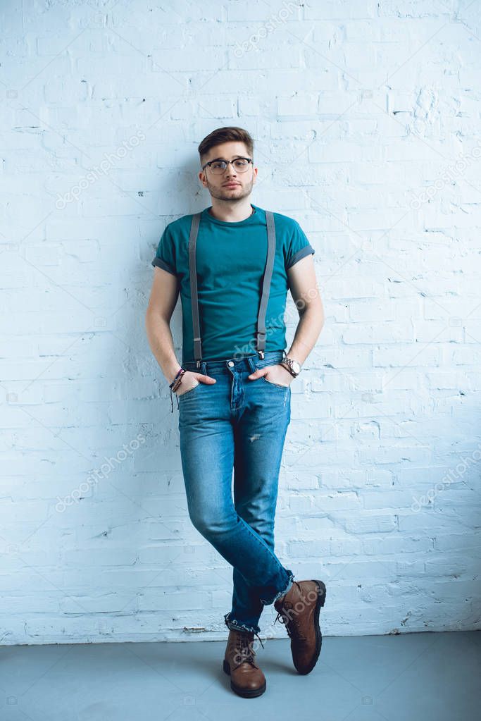 Bearded young man wearing t-shirt and jeans