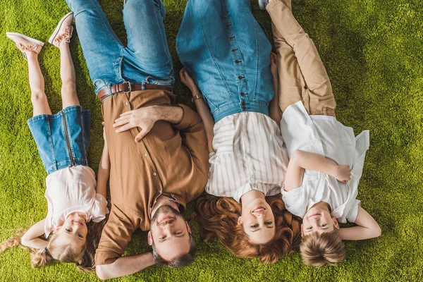 Top View Happy Family Lying Lawn Smiling Camera — Stock Photo, Image