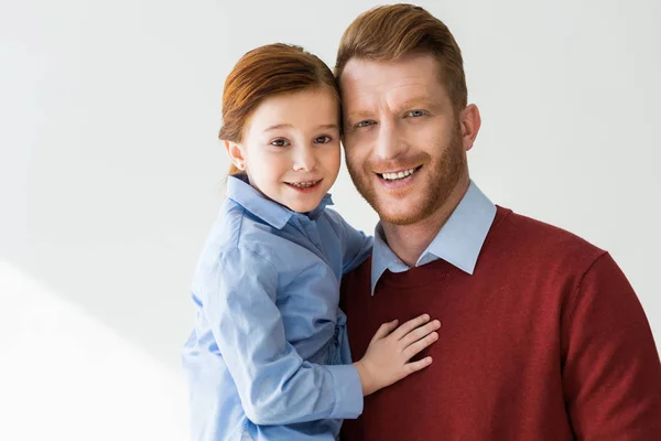 Happy Redhead Father Daughter Embracing Smiling Camera Grey — Stock Photo, Image
