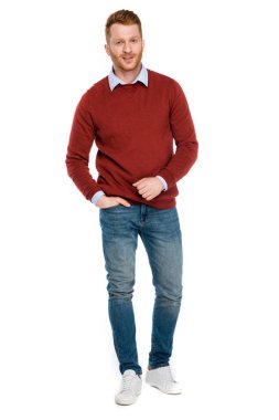 full length view of handsome redhead man looking at camera isolated on white clipart