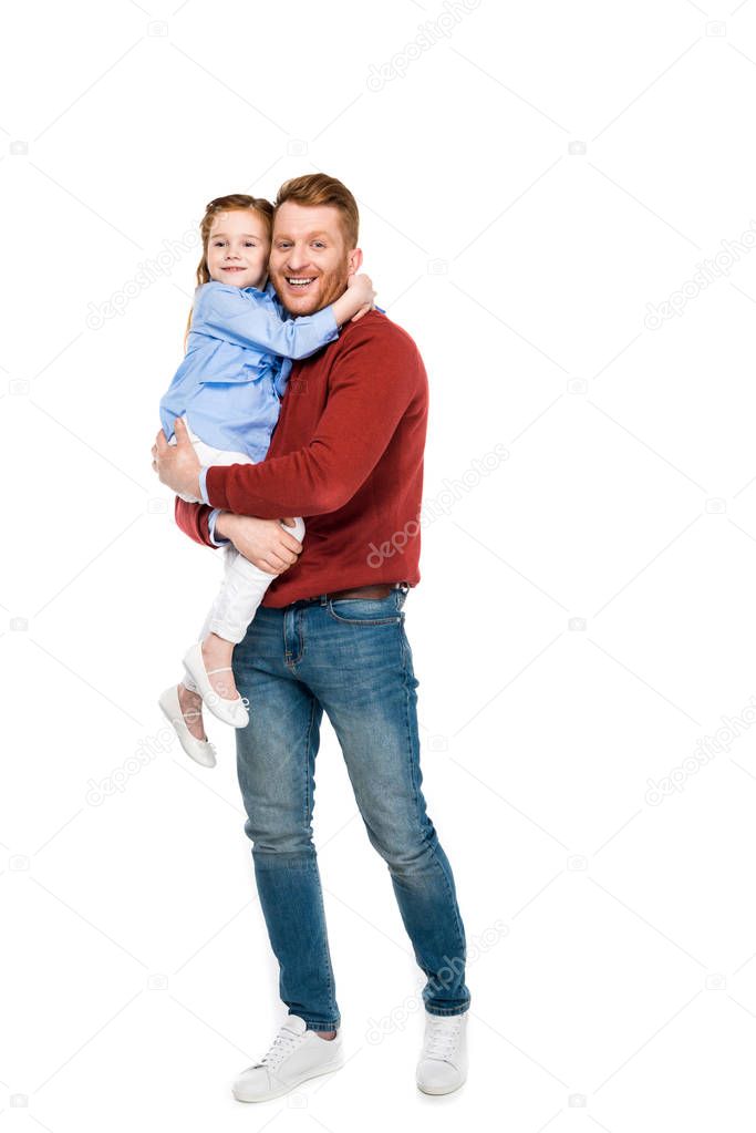 happy father and daughter hugging and smiling at camera isolated on white