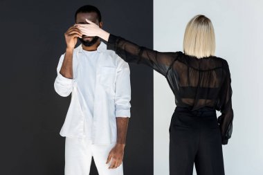 sarışın kız Afro-Amerikan erkek gözler, yin yang kavramı kapsayan