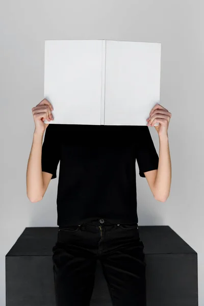 Stylish Woman Black Clothes Covering Face White Book Isolated Grey — Stock Photo, Image