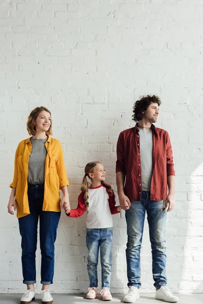 Happy Family One Child Holding Hands While Standing Together Looking — Stock Photo, Image