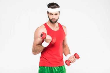 retro spor eğitim üzerinde beyaz izole dumbbells ile sporcu