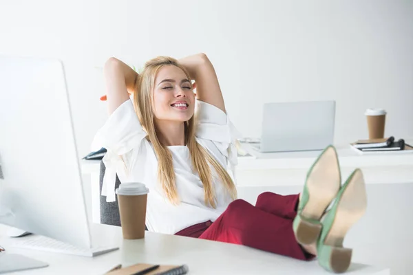 Beautiful Smiling Young Businesswoman Closed Eyes Sitting Hands Head Workplace — Stock Photo, Image