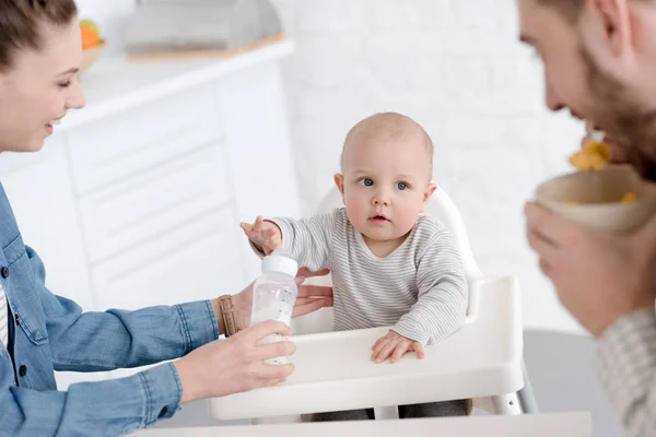 Parents Feeding Baby Boy Milk Baby Bottle Kitchen — Stock Photo, Image