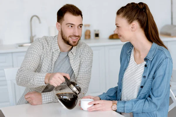 Boyfriend Pouring Coffee Girlfriend Kitchen — Stock Photo, Image