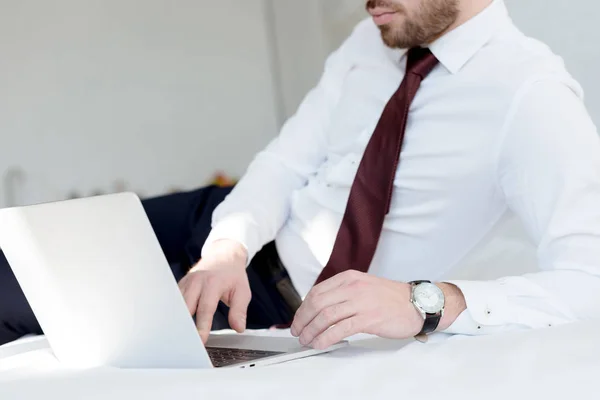 Cropped View Businessman Using Laptop Bed — Free Stock Photo