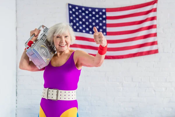 Happy Senior Woman Sportswear Holding Tape Recorder Showing Thumb — Stock Photo, Image