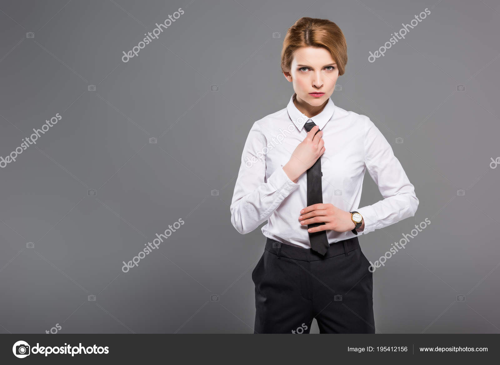 woman in white shirt and tie