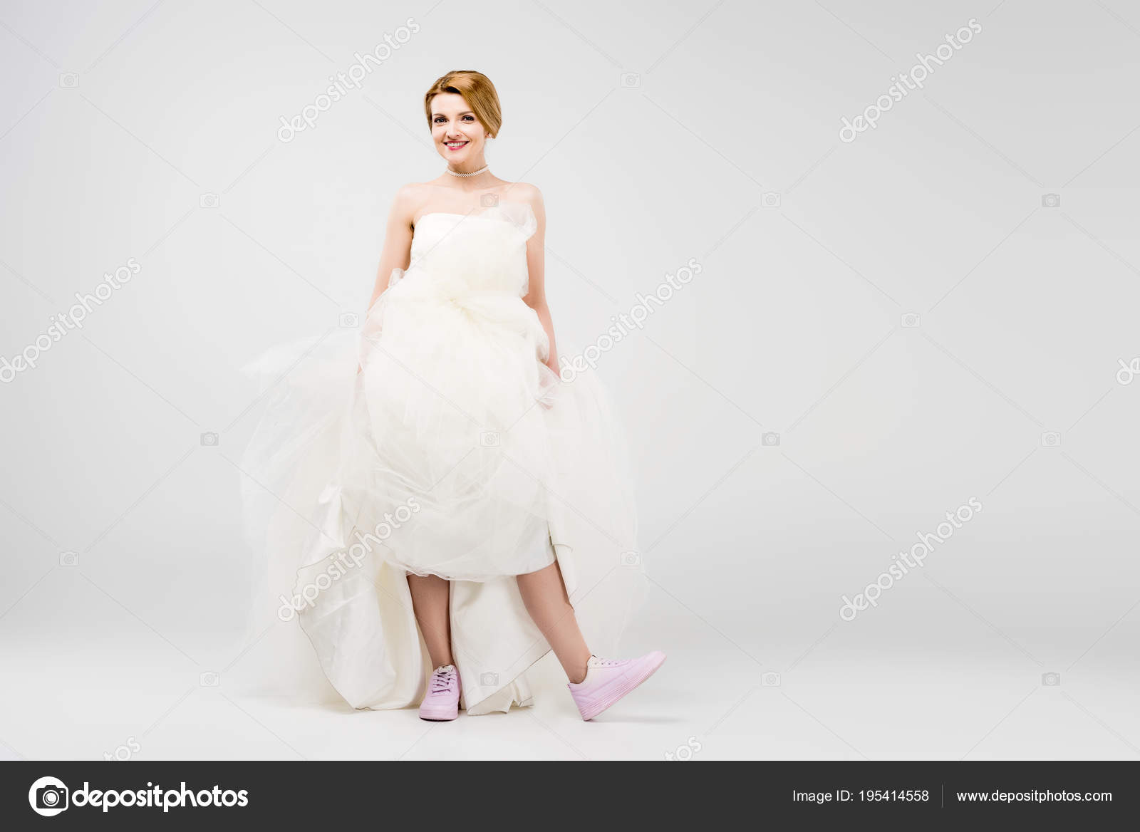 wedding gown and sneakers