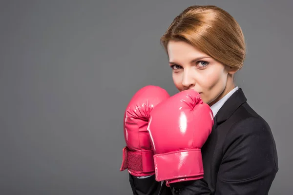 Attractive Businesswoman Suit Pink Boxing Gloves Isolated Grey — Stock Photo, Image