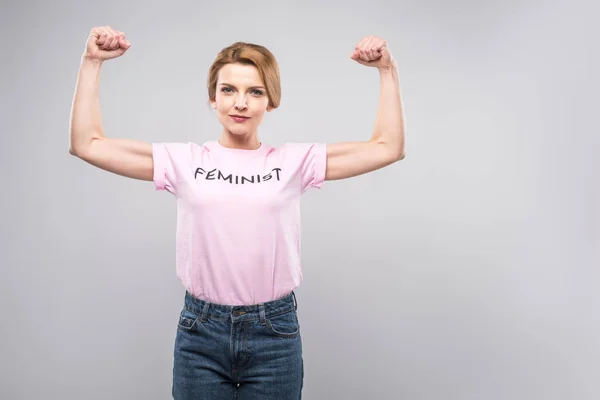 Strong Woman Pink Feminist Shirt Showing Muscles Arms Isolated Grey — Stock Photo, Image