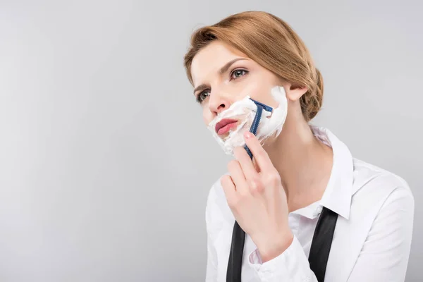 Beautiful Businesswoman Shaving Face Her Face Isolated Grey Feminism Concept — Stock Photo, Image