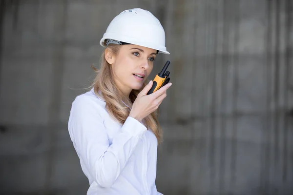Engineer using walkie-talkie — Stock Photo