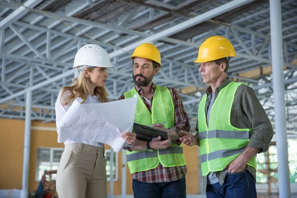 Professional engineers working together — Stock Photo