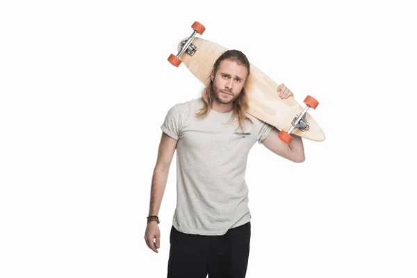 Jeune homme avec longboard — Photo de stock