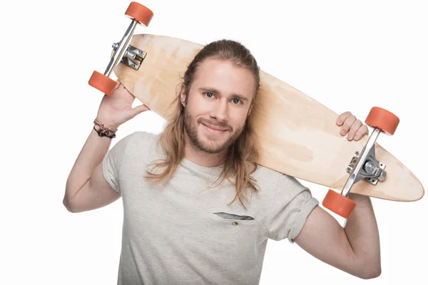 Junger Mann mit Longboard — Stockfoto