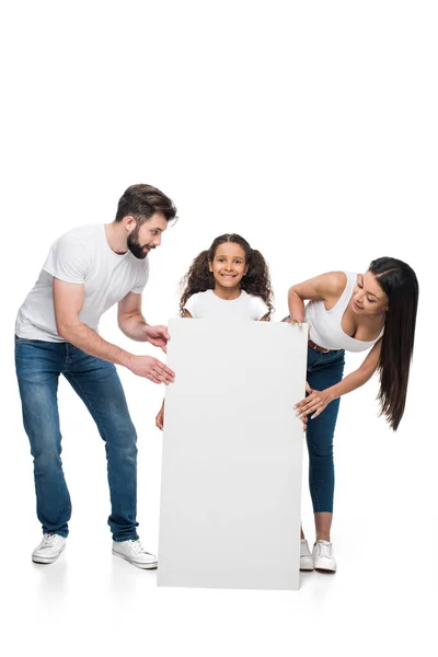 Family holding banner — Stock Photo