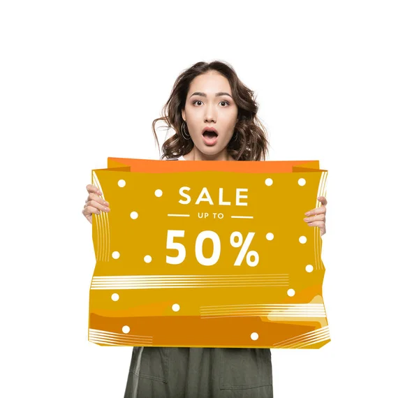 Woman with sale banner — Stock Photo