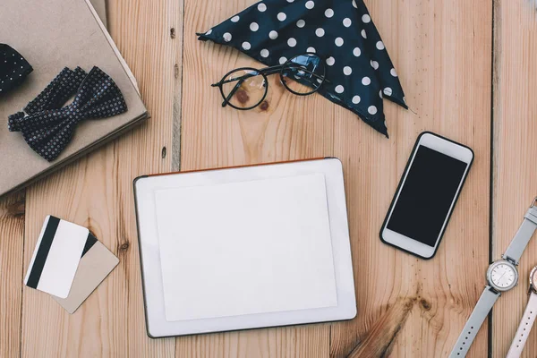 Gadgets with credit cards and accessories — Stock Photo