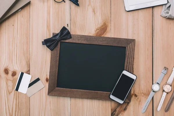 Smartphone and blank frame — Stock Photo