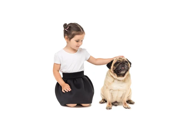 Girl with pug dog — Stock Photo