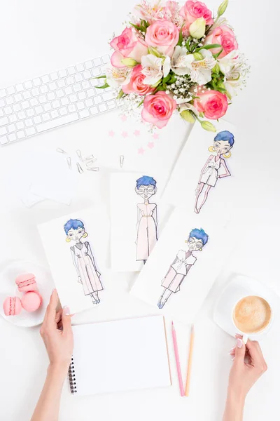 Fashion designer working with sketches — Stock Photo