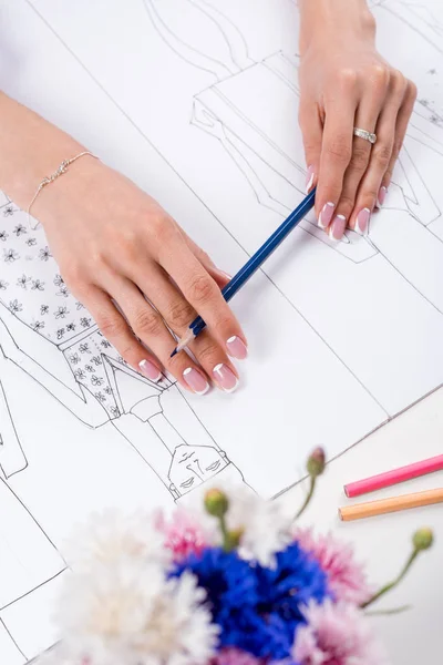 Fashion designer working with sketches — Stock Photo