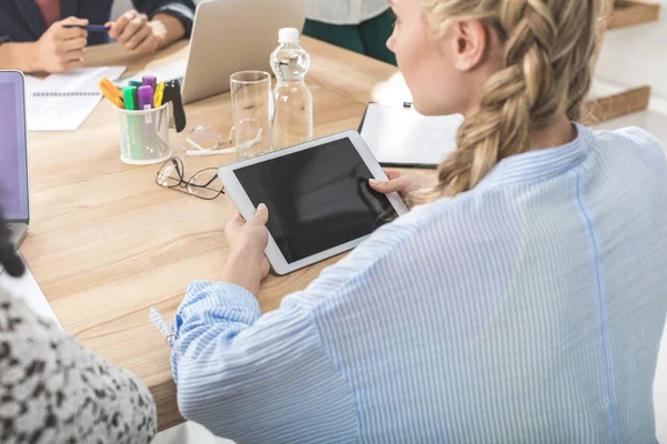 Businesswoman holding tablet — Stock Photo