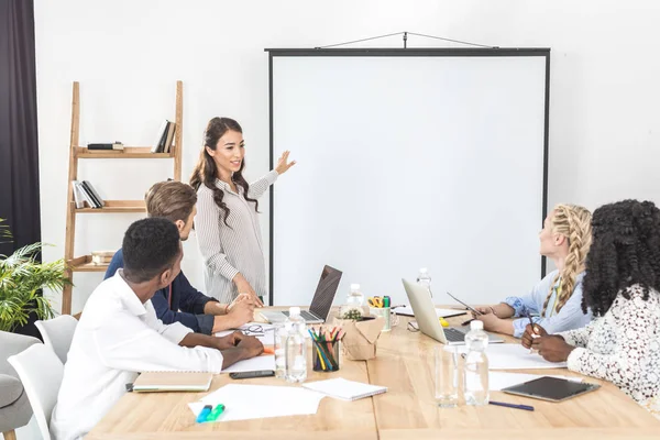 Asian businesswoman making presentation — Stock Photo