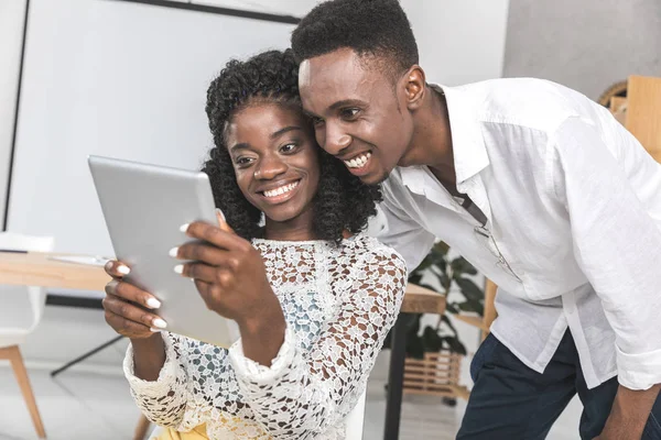 African american businesspeople with tablet — Stock Photo