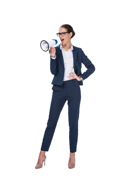Angry businesswoman screaming with megaphone — Stock Photo