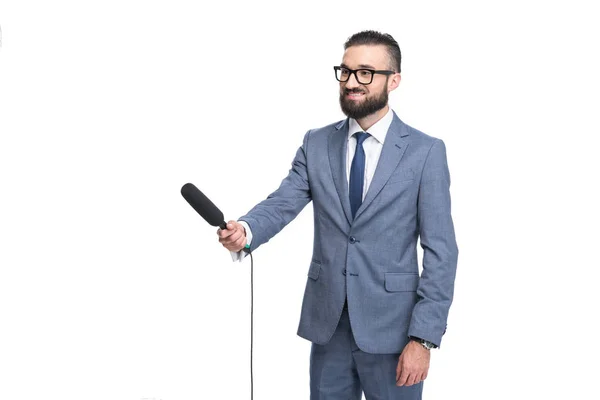 Journalist taking interview with microphone — Stock Photo