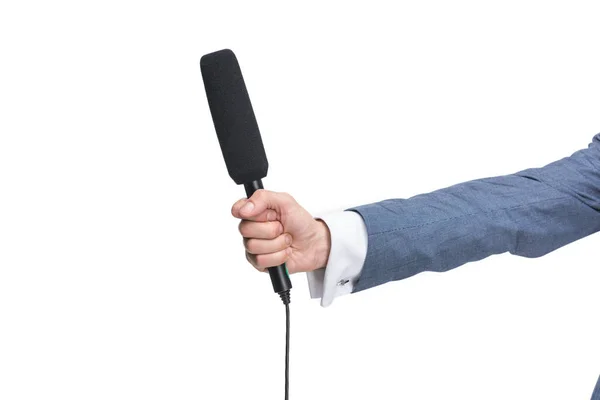 Holding microphone for interview — Stock Photo