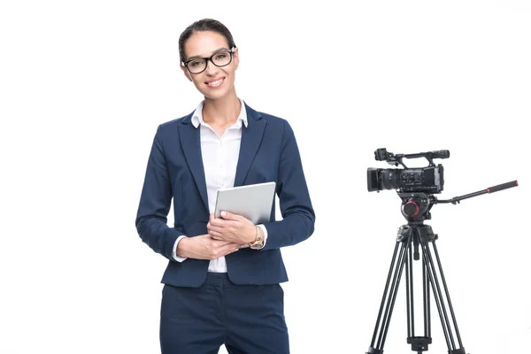 Television reporter and video camera — Stock Photo