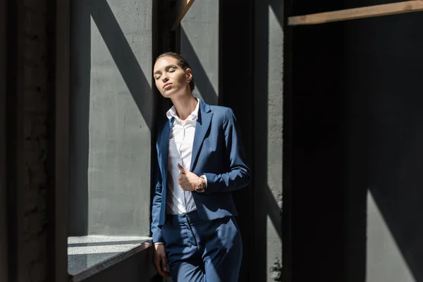 Beautiful pensive businesswoman — Stock Photo