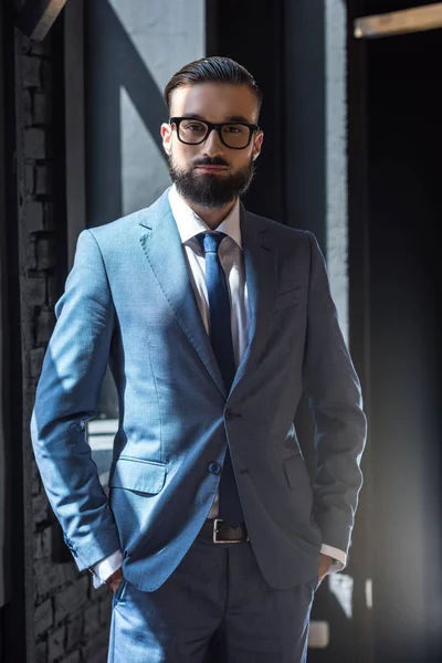 Handsome confident businessman — Stock Photo