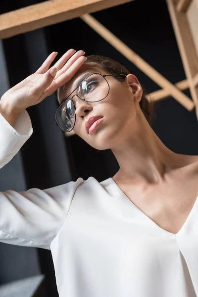 Thoughtful stylish businesswoman — Stock Photo