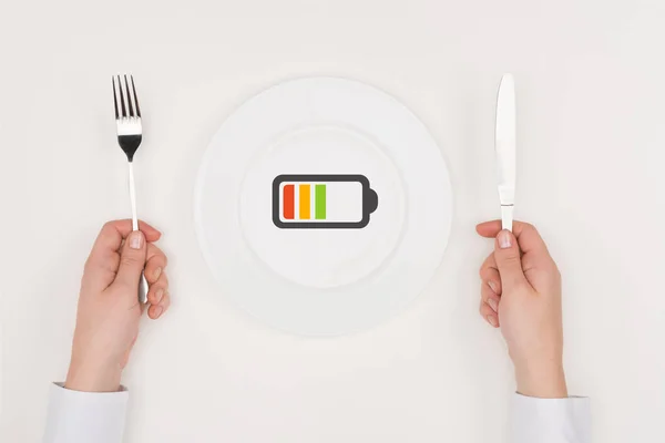 Charging battery icon on plate — Stock Photo