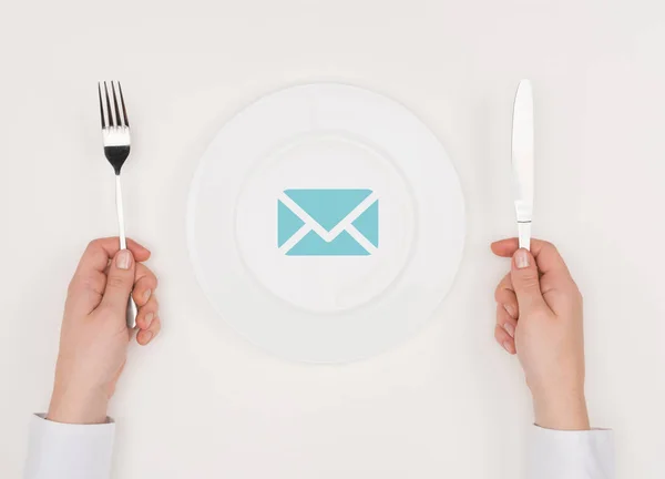 Message icon on plate — Stock Photo