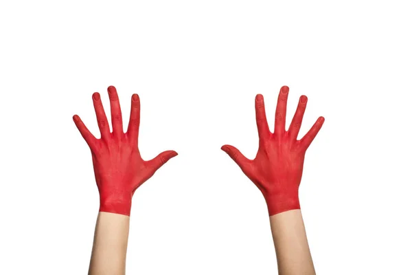 Hands in red paint — Stock Photo