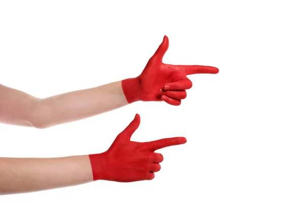 Señalando las manos en pintura roja - foto de stock