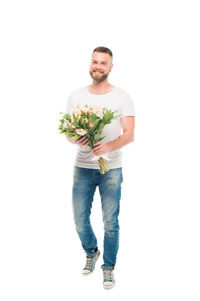 Bearded man standing with bouquet — Stock Photo