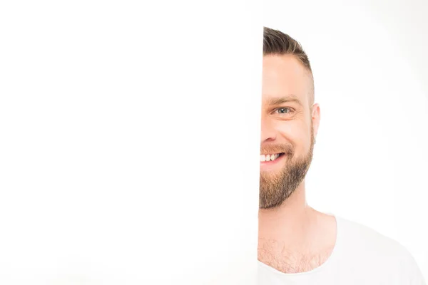 Man looking out of blank banner — Stock Photo