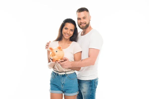 Couple with piggy bank — Stock Photo