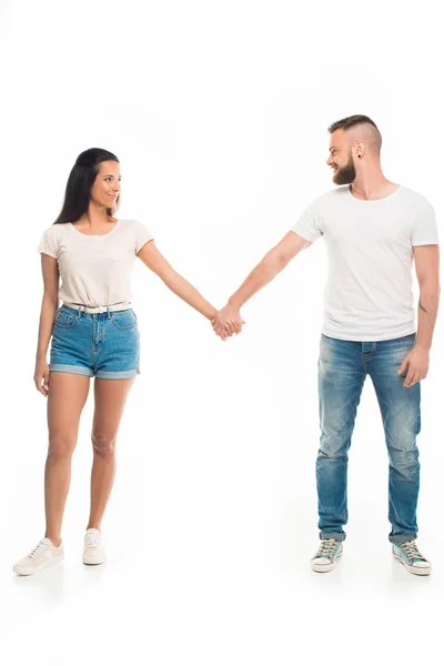 Jeune couple attrayant tenant la main — Photo de stock